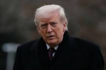 President Donald Trump looks over after stepping off Marine One on the South Lawn of the White ...