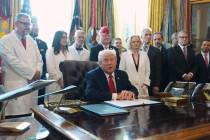 President Donald Trump speaks during an executive order signing in the Oval Office of the White ...