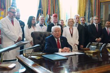 President Donald Trump speaks during an executive order signing in the Oval Office of the White ...