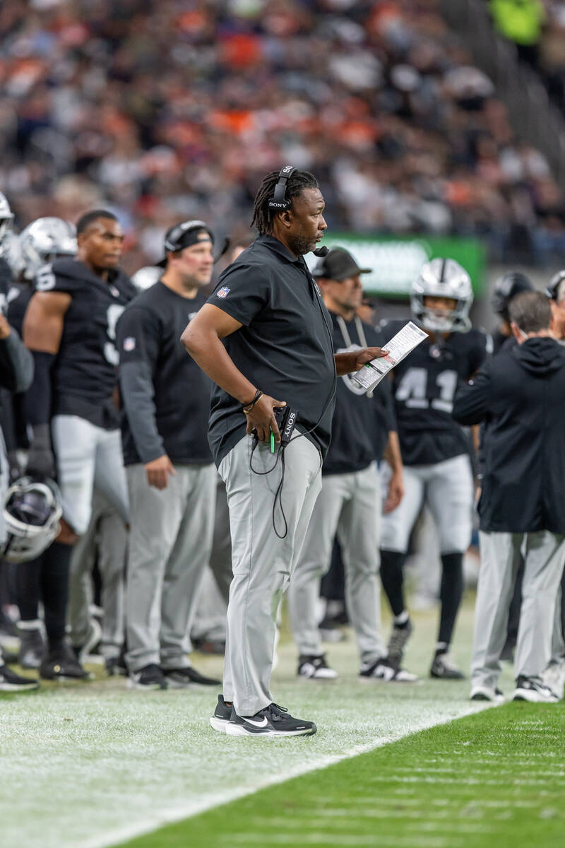 Las Vegas Raiders defensive coordinator Patrick Graham coaches against the Denver Broncos in an ...