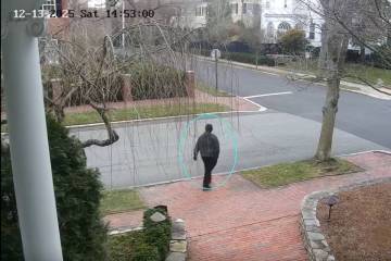 This image taken from video provided by the FBI shows a person of interest in the investigation ...