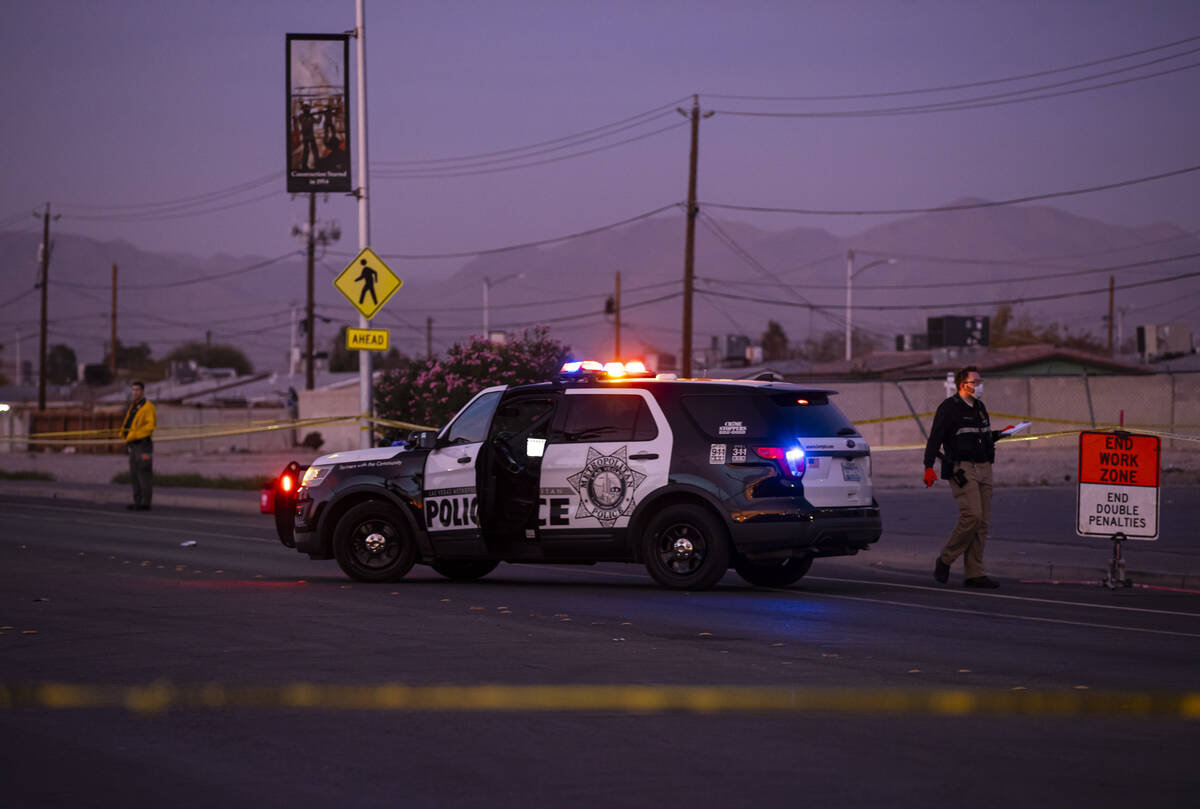 Metropolitan Police Department officers investigate the scene where a person was fatally stabbe ...