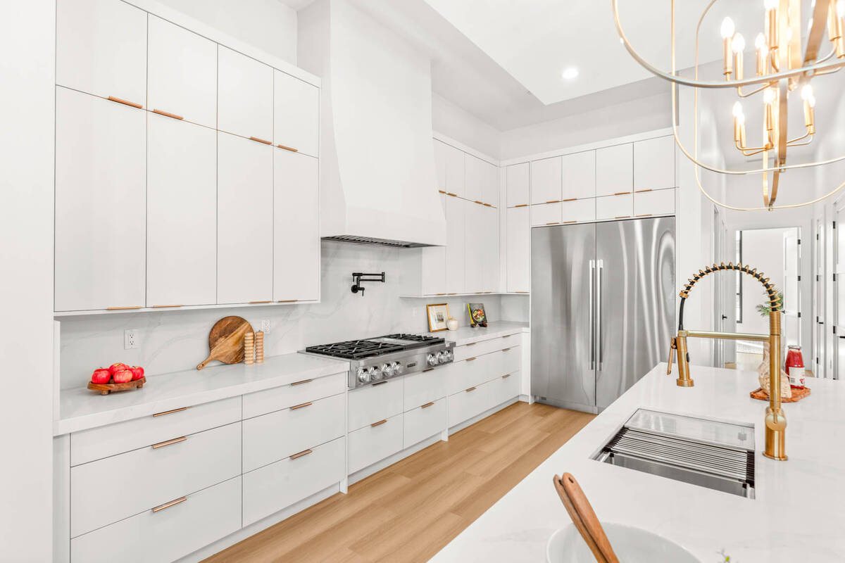 Located at 5855 Saint Ebbes Court, this is the first of eight homes located in the “ultra-pri ...