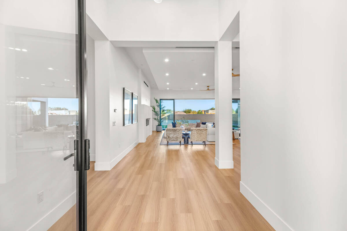 Located at 5855 Saint Ebbes Court, this is the first of eight homes located in the “ultra-pri ...