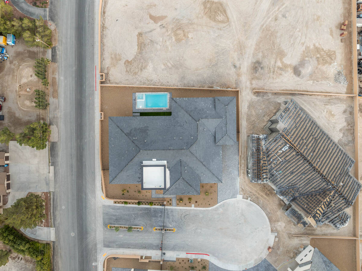 Located at 5855 Saint Ebbes Court, this is the first of eight homes located in the “ultra-pri ...