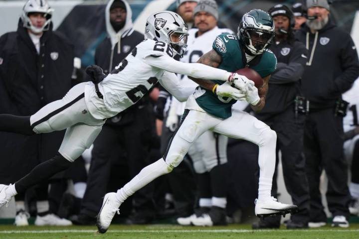 Philadelphia Eagles wide receiver Devonta Smith (6) catches a pass in front of Las Vegas Raider ...