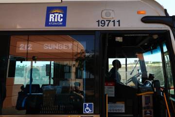 People enter an RTC bus at the South Strip Transit Terminal on Wednesday, June 19, 2024, in Las ...