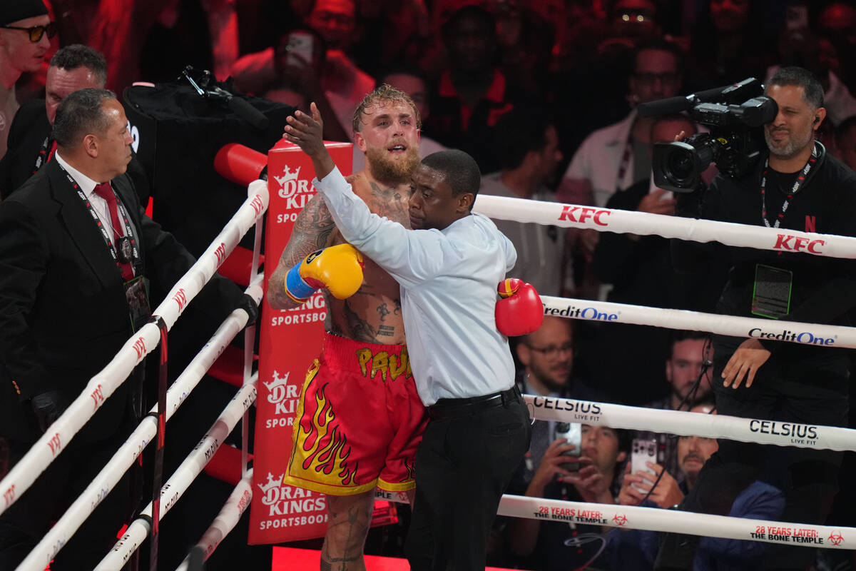 Jake Paul reacts during the heavyweight boxing match against Anthony Joshua, Friday, Dec. 19, 2 ...