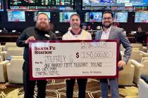 Santa Fe Station sportsbook manager Kyle McKeown, left, and director of operations Francisco Se ...