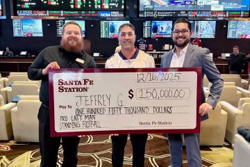 Santa Fe Station sportsbook manager Kyle McKeown, left, and director of operations Francisco Se ...