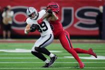 Las Vegas Raiders tight end Brock Bowers (89) runs against Houston Texans safety Jalen Pitre du ...
