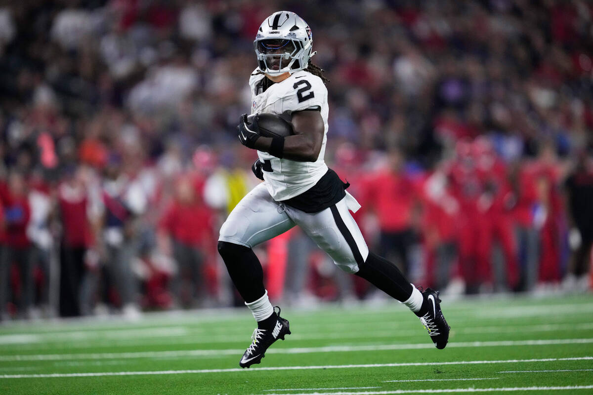 Las Vegas Raiders running back Ashton Jeanty (2) runs for a touchdown during the second half of ...