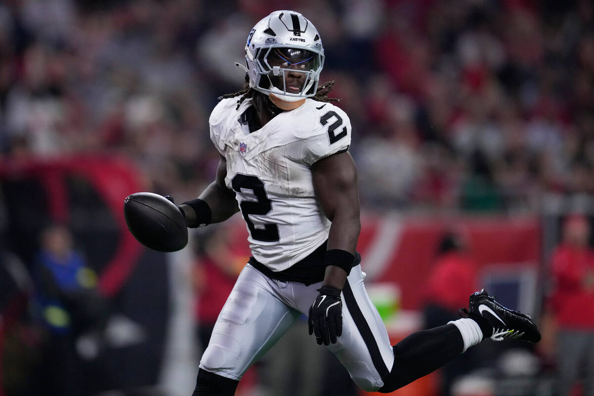 Las Vegas Raiders running back Ashton Jeanty (2) runs for a touchdown during the second half of ...