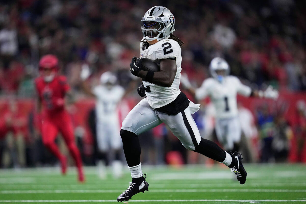 Las Vegas Raiders running back Ashton Jeanty (2) runs for a touchdown during the second half of ...