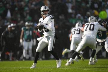 Las Vegas Raiders quarterback Kenny Pickett in action during an NFL football game, Sunday, Dec. ...