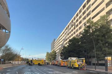 Crews respond to fire Sunday, Dec. 21, 2025, at the employee parking garage of the Aria, 3730 L ...