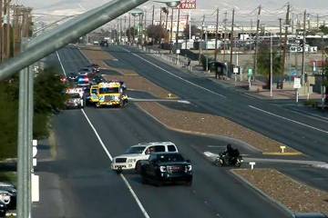 Police investigate a crash Sunday, Dec. 21, 2025, on North Las Vegas Boulevard and Walnut Road ...