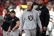 Las Vegas Raiders head coach Pete Carroll walks on the sideline during the first half of an NFL ...