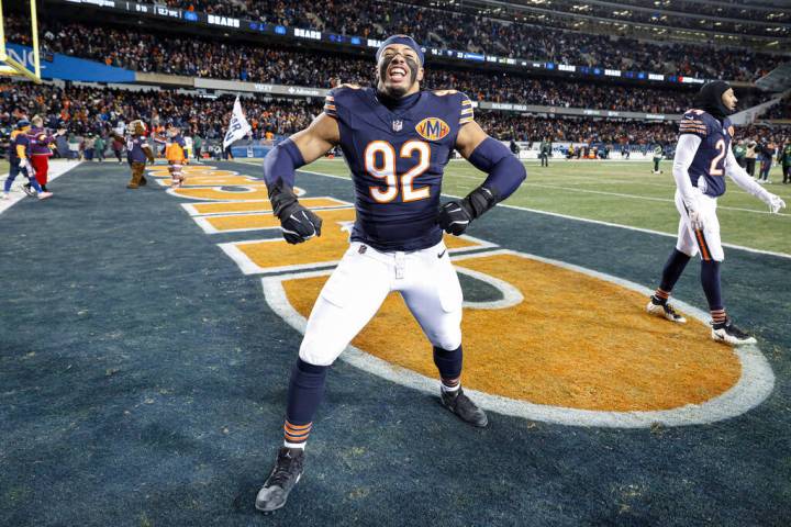 Chicago Bears defensive end Daniel Hardy (92) celebrates after an NFL football game against the ...