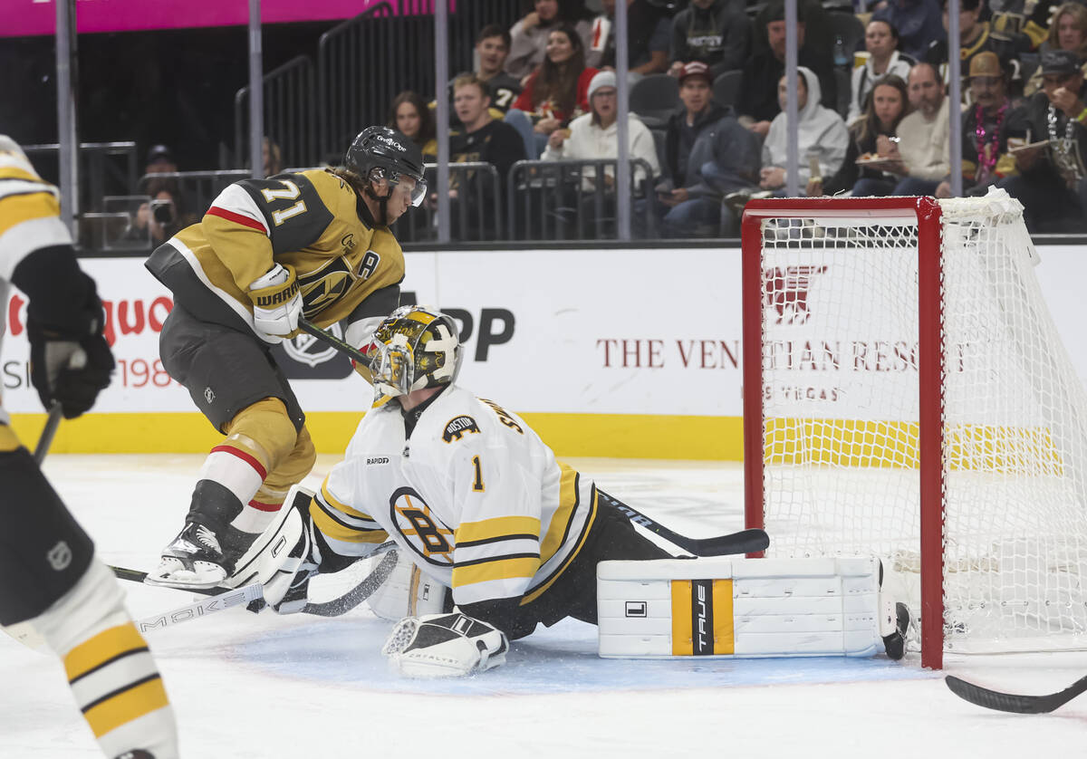 Golden Knights center William Karlsson (71) skates around to score past Boston Bruins goaltende ...