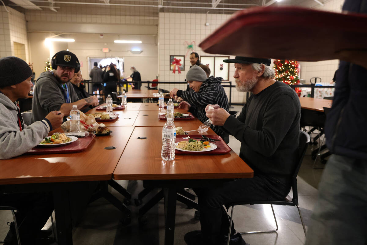 Timothy Wann, 59, eats a Christmas meal at Catholic Charities of Southern Nevada in Las Vegas T ...