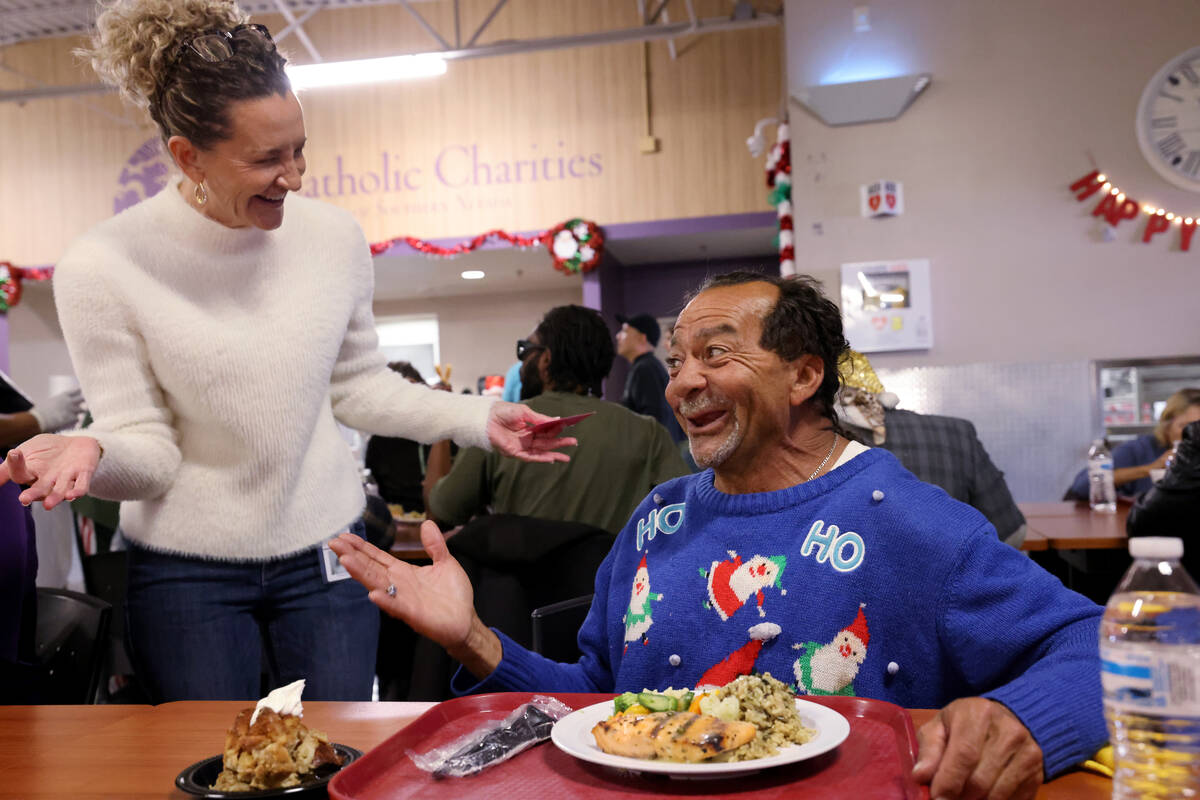 Catholic Charities of Southern Nevada President and CEO Sara Ramirez delivers dessert to Keath ...