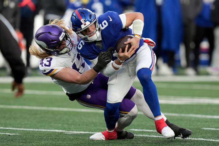 Minnesota Vikings outside linebacker Andrew van Ginkel (43) sacks New York Giants quarterback J ...