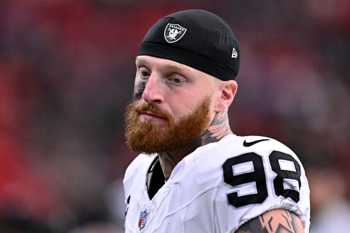 Las Vegas Raiders defensive end Maxx Crosby (98) looks on during the first half of an NFL footb ...