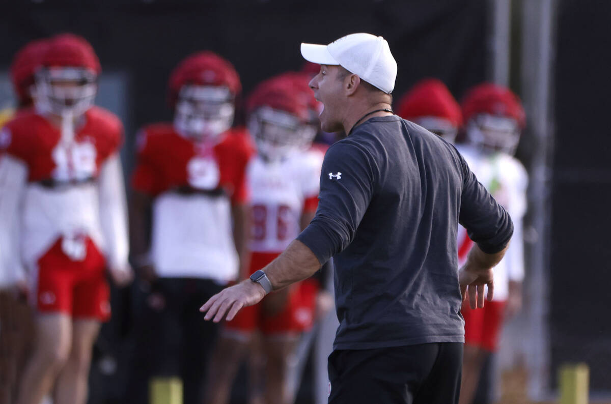 Utah's head coach Morgan Scalley speaks to his players during the team's practice at the Fertit ...