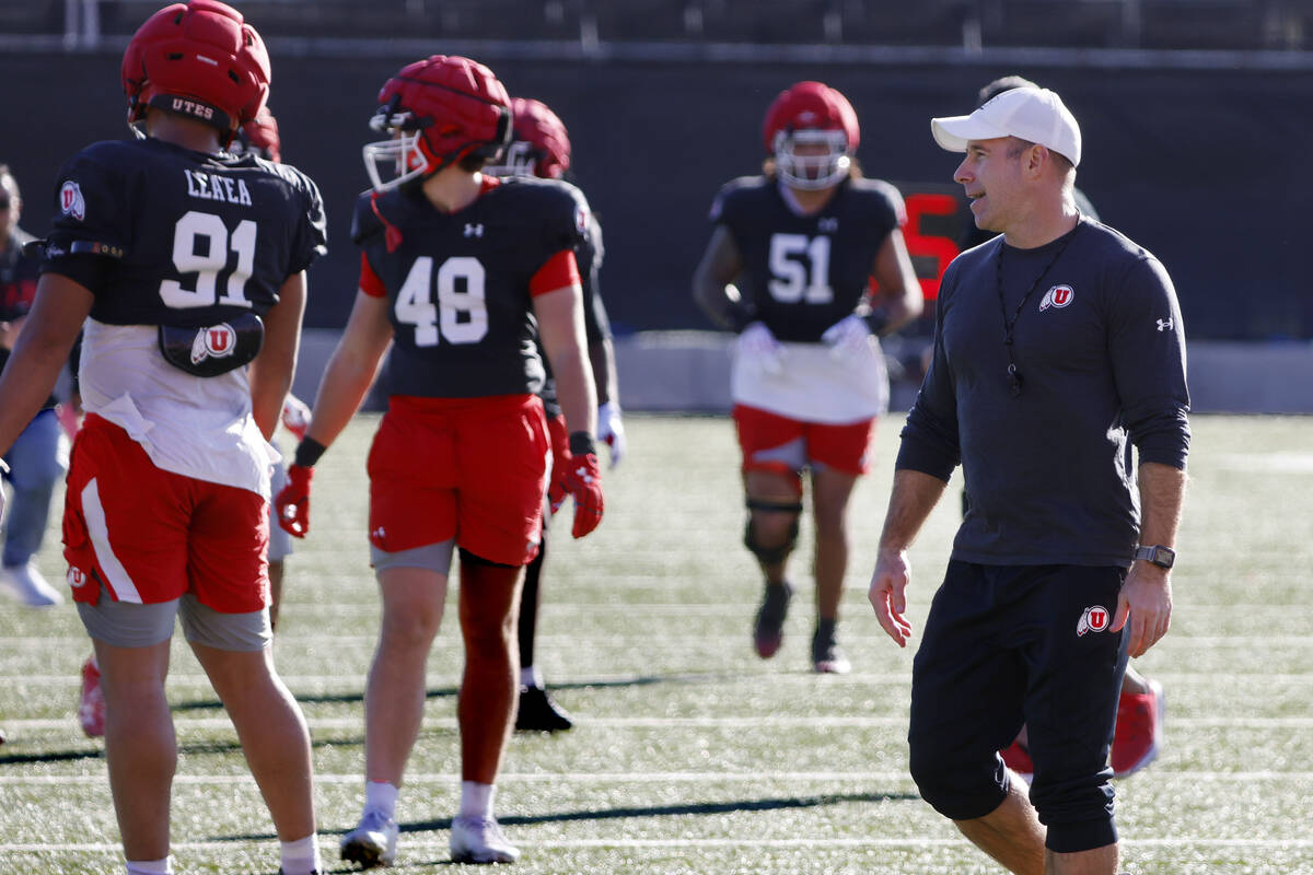 Utha's head coach Morgan Scalley watches over the team’s practice at the Fertitta F ...