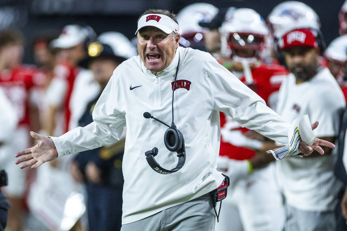 UNLV head coach Dan Mullen is frustrated by another questionable call in favor of Utah State du ...