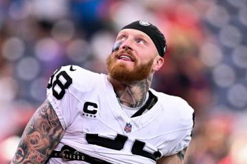 Las Vegas Raiders defensive end Maxx Crosby (98) reacts prior to an NFL football game against t ...