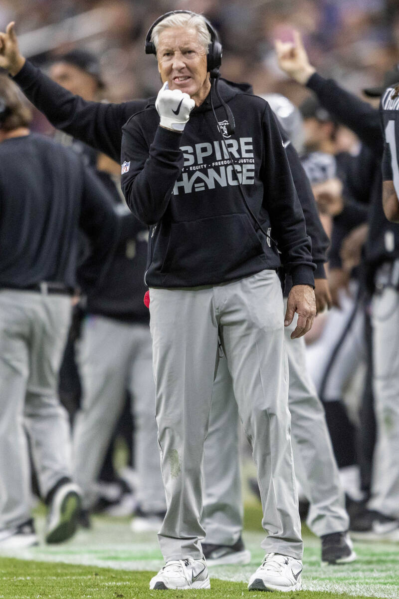 Raiders head coach Pete Carroll gestures during the first half of an NFL game at Allegiant Stad ...