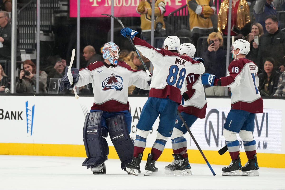 Colorado Avalanche goaltender Scott Wedgewood (41) celebrates with teammates after stopping a s ...