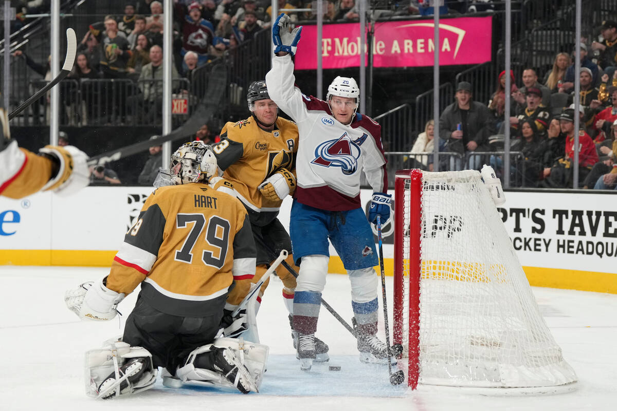 Colorado Avalanche center Nathan MacKinnon (29) scores against Vegas Golden Knights goaltender ...
