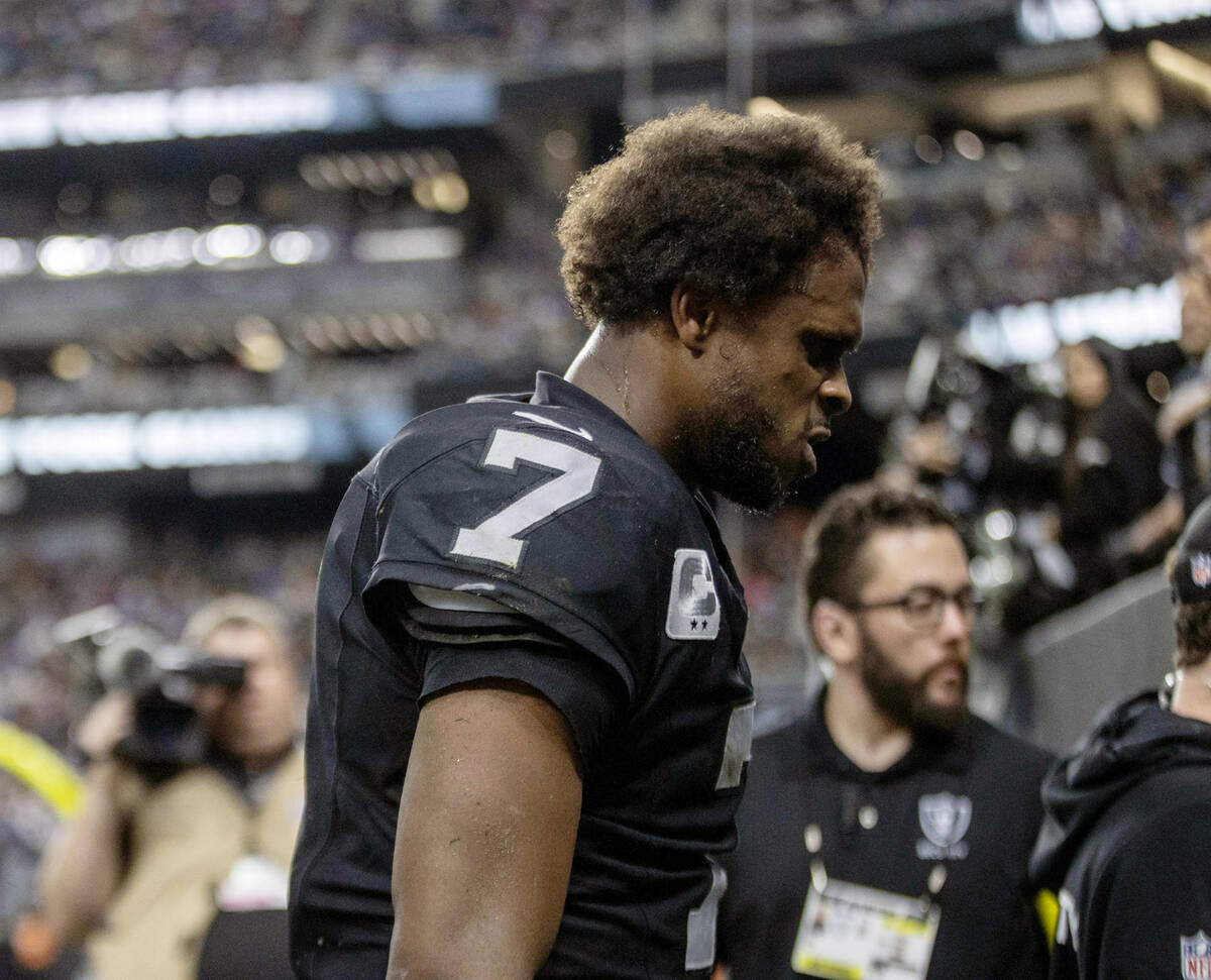 Raiders quarterback Geno Smith (7) leaves the game against the New York Giants with an injury d ...
