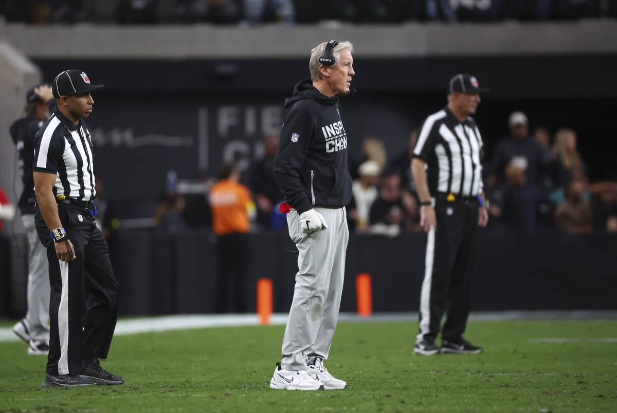 Raiders head coach Pete Carroll looks on during the second half of an NFL game against the New ...