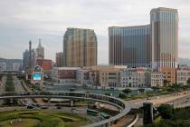 The Venetian Macao casino resorts stand at Cotai Strip in Macao, June 3, 2018. (AP Photo/Kin Ch ...