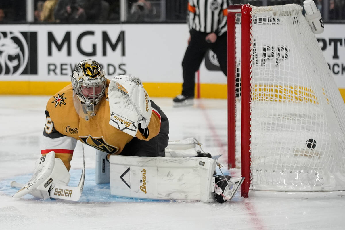 Vegas Golden Knights goaltender Carter Hart (79) watches as he is scored on by Minnesota Wild l ...