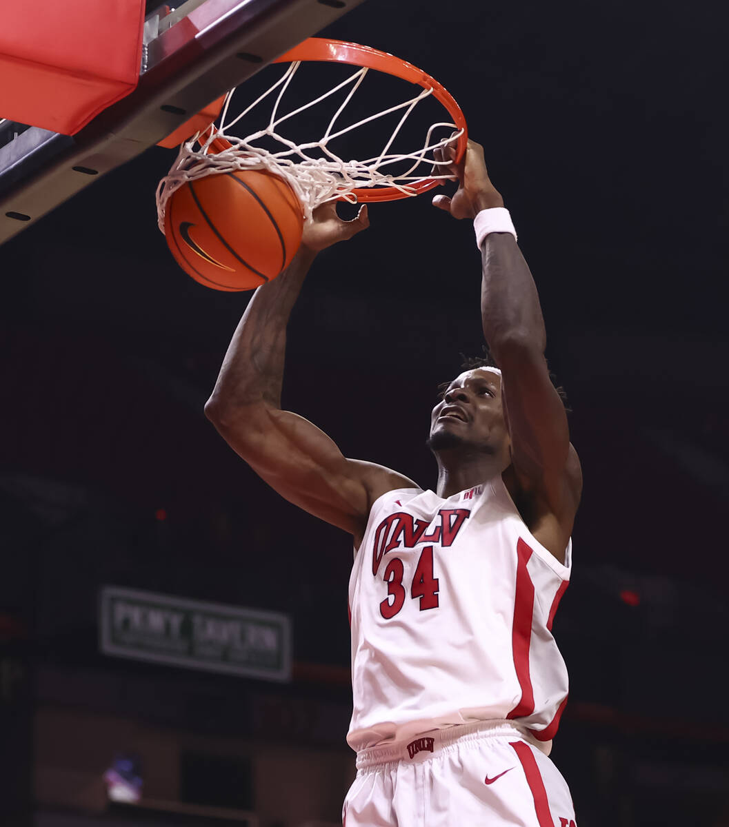 UNLV Rebels center Emmanuel Stephen (34) dunks the ball against the La Sierra Golden Eagles dur ...