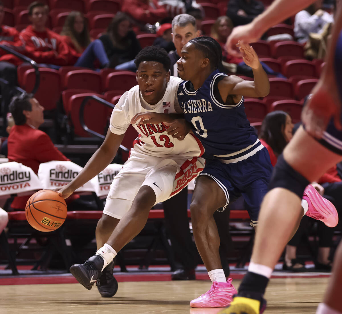 UNLV Rebels guard Issac Williamson (12) drives to the basket against La Sierra Golden Eagles gu ...