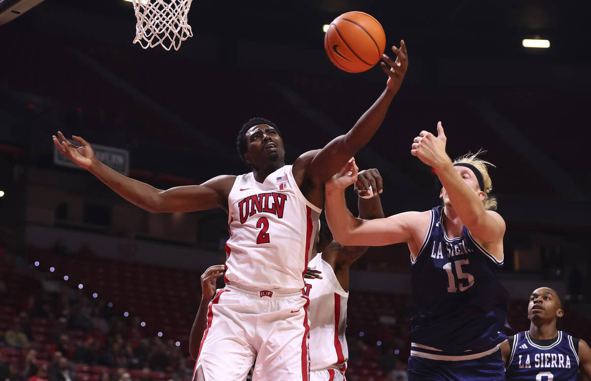 UNLV Rebels forward Kimani Hamilton (2) pulls in a rebound against La Sierra Golden Eagles cent ...