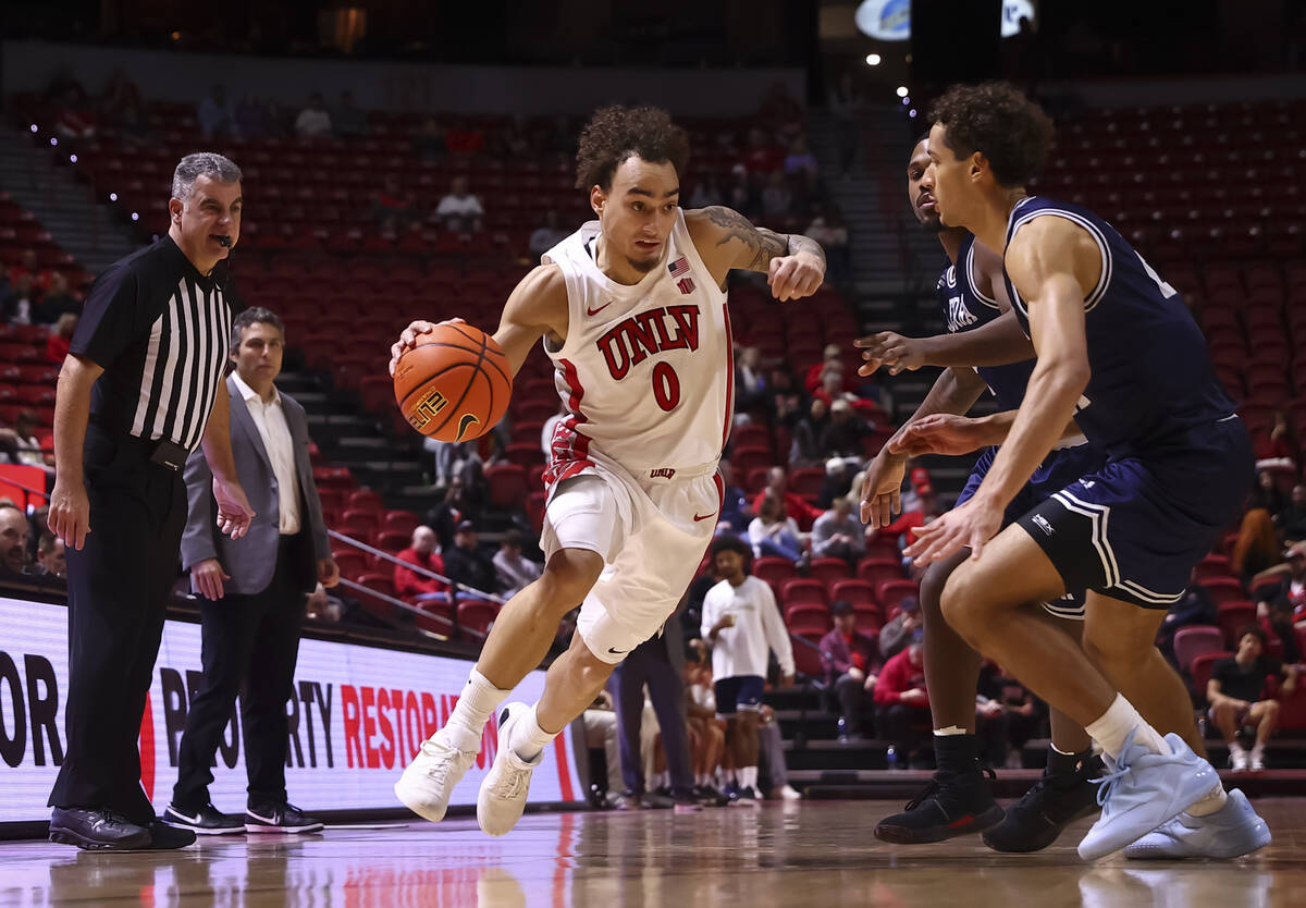 UNLV Rebels guard Dravyn Gibbs-Lawhorn (0) drives to the basket against La Sierra Golden Eagles ...