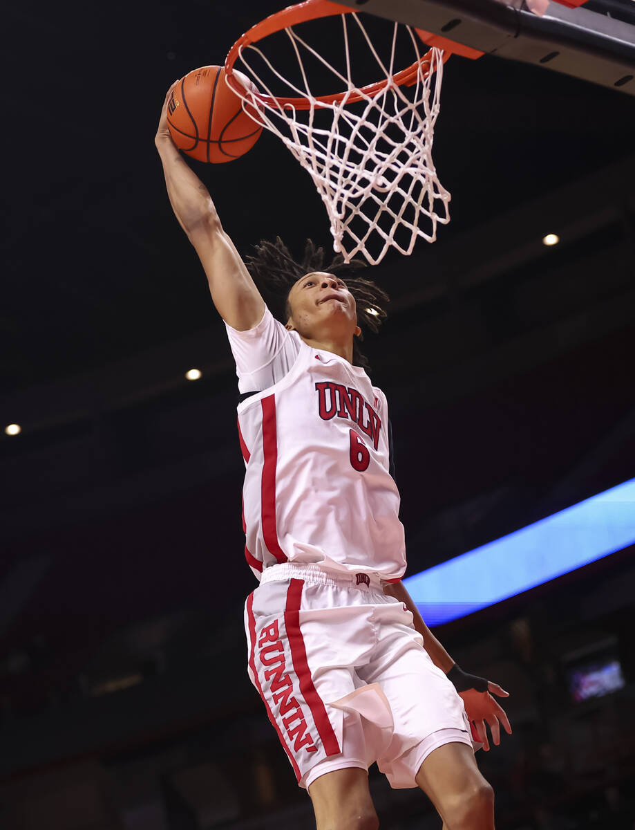 UNLV Rebels forward Tyrin Jones (6) dunks the ball against the La Sierra Golden Eagles during t ...
