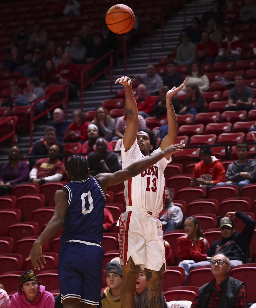 UNLV Rebels guard Jalen Cunningham (13) shoots over La Sierra Golden Eagles guard Makael Reynol ...