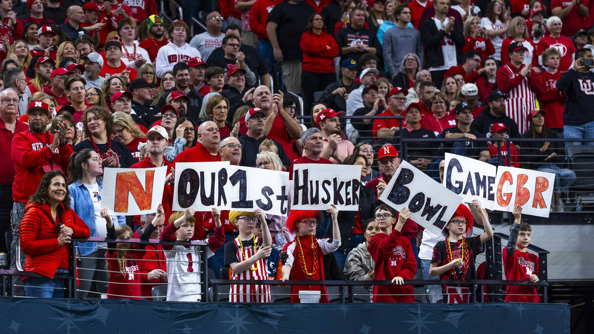 Young Nebraska Cornhuskers fans attend their first bowl game against the Utah Utes during the f ...