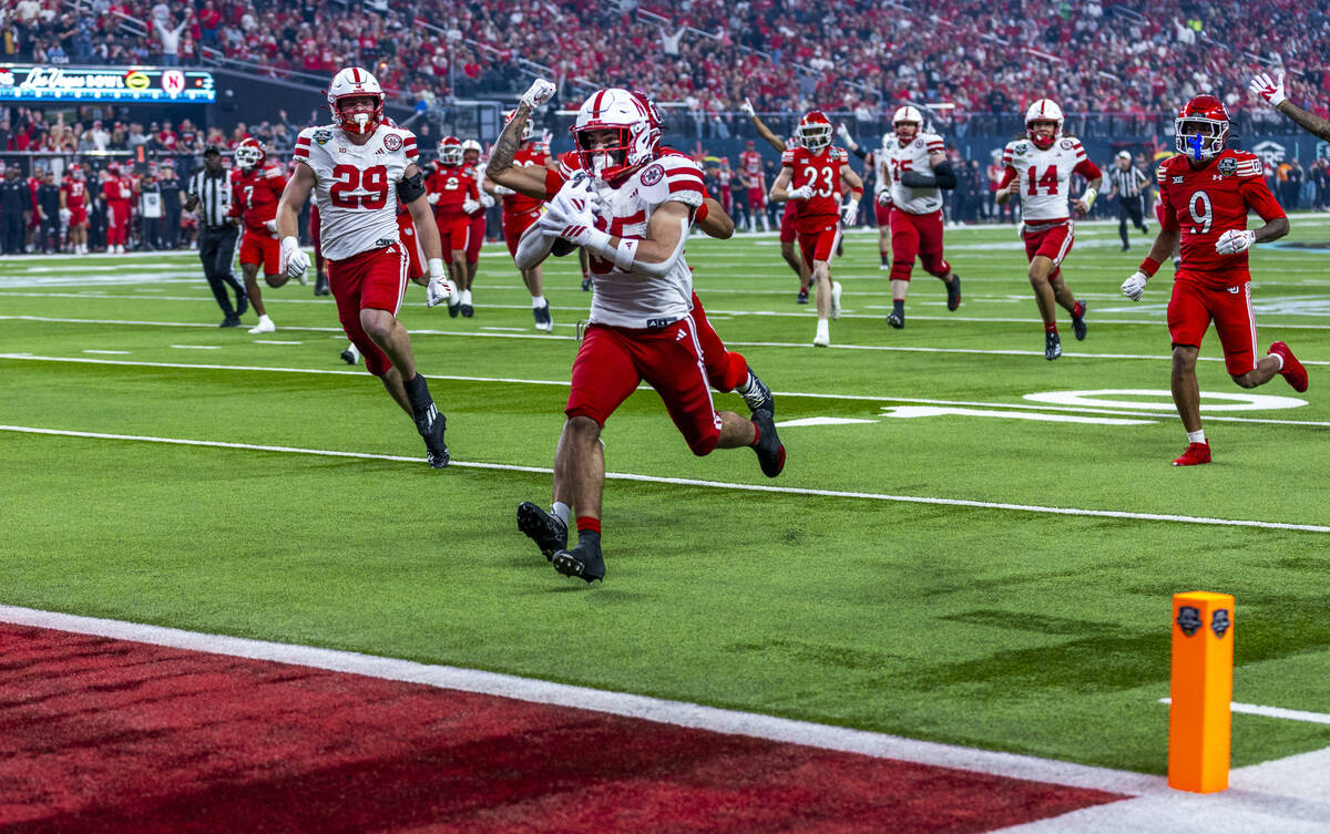 Nebraska Cornhuskers running back Mekhi Nelson (35) heads for the end zone with Utah Utes safet ...