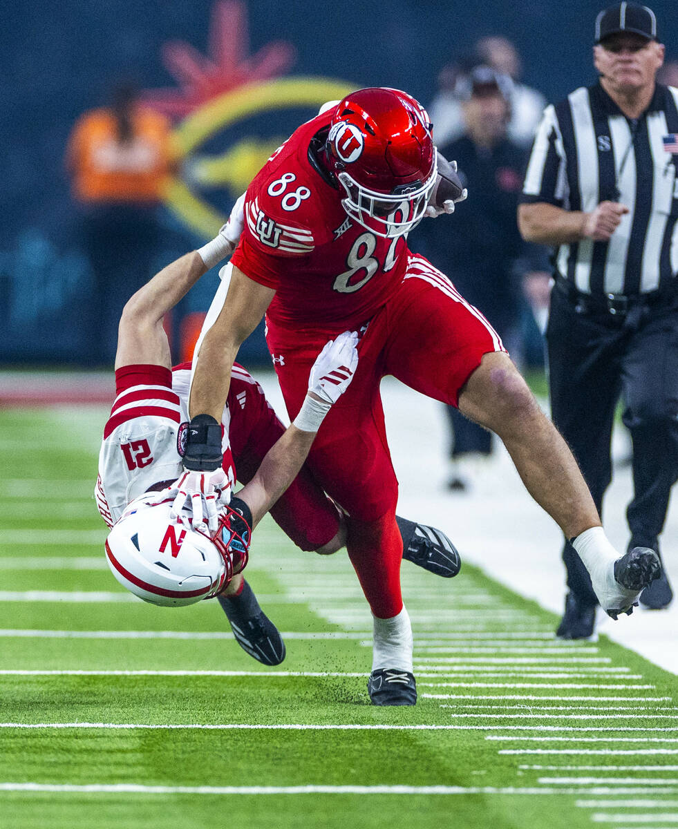 Utah Utes tight end Dallen Bentley (88) pushes Nebraska Cornhuskers defensive back Rex Guthrie ...