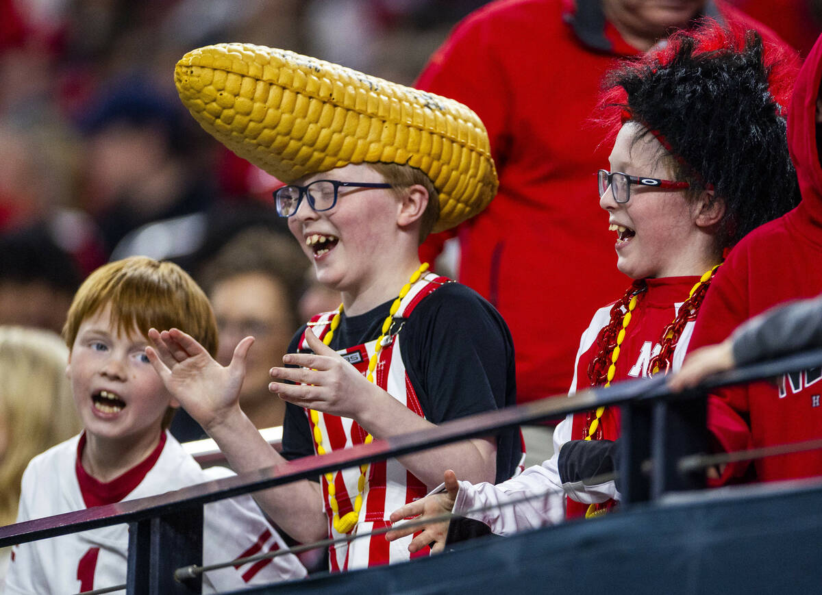 Young Nebraska Cornhuskers fans still have fun as the Utah Utes pull away even more during the ...