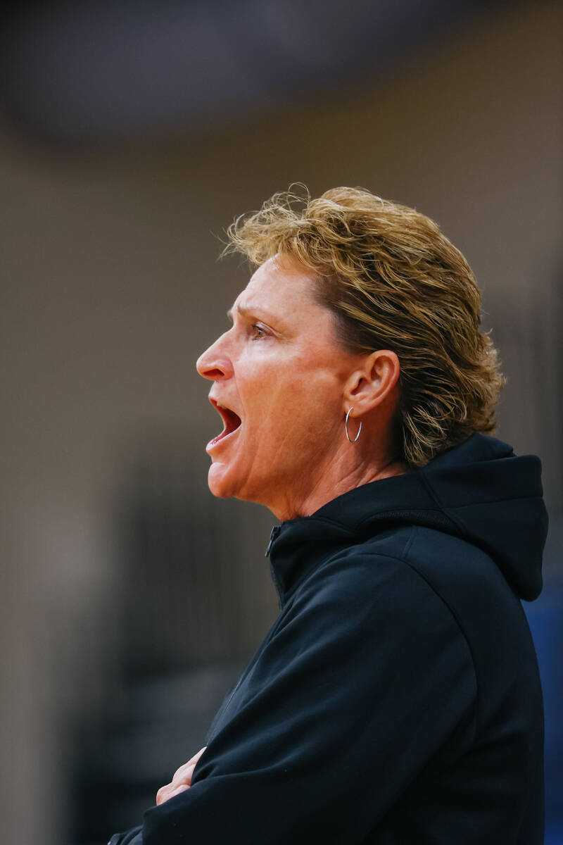 Centennial head coach Karen Weitz urges her players to talk to each other during the girls  ...